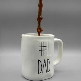 Coffee Cup with #1 Dad Written On It